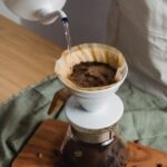 Close detail of a warm-toned pour-over coffee ritual