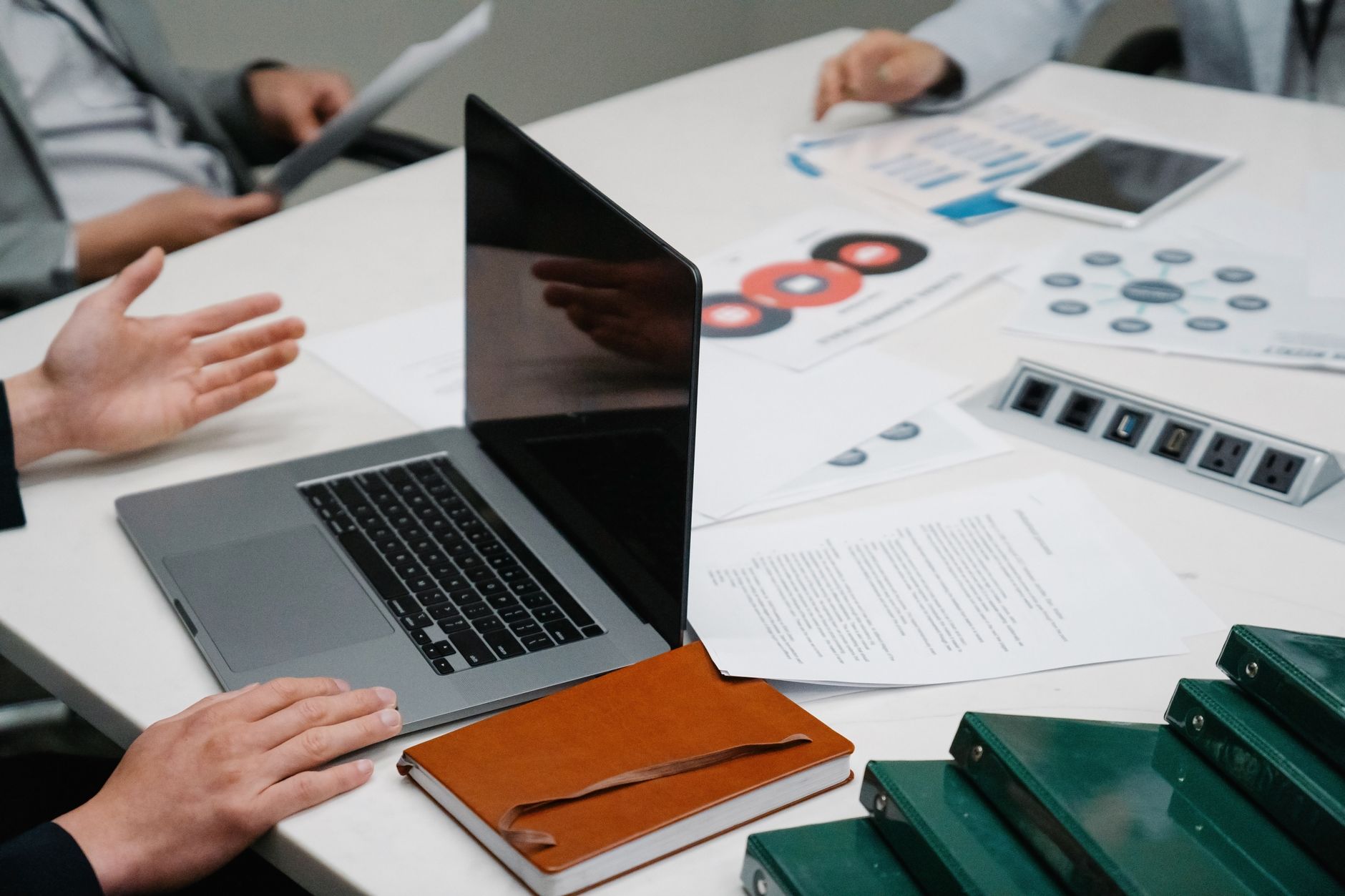 Business planning documents and laptop