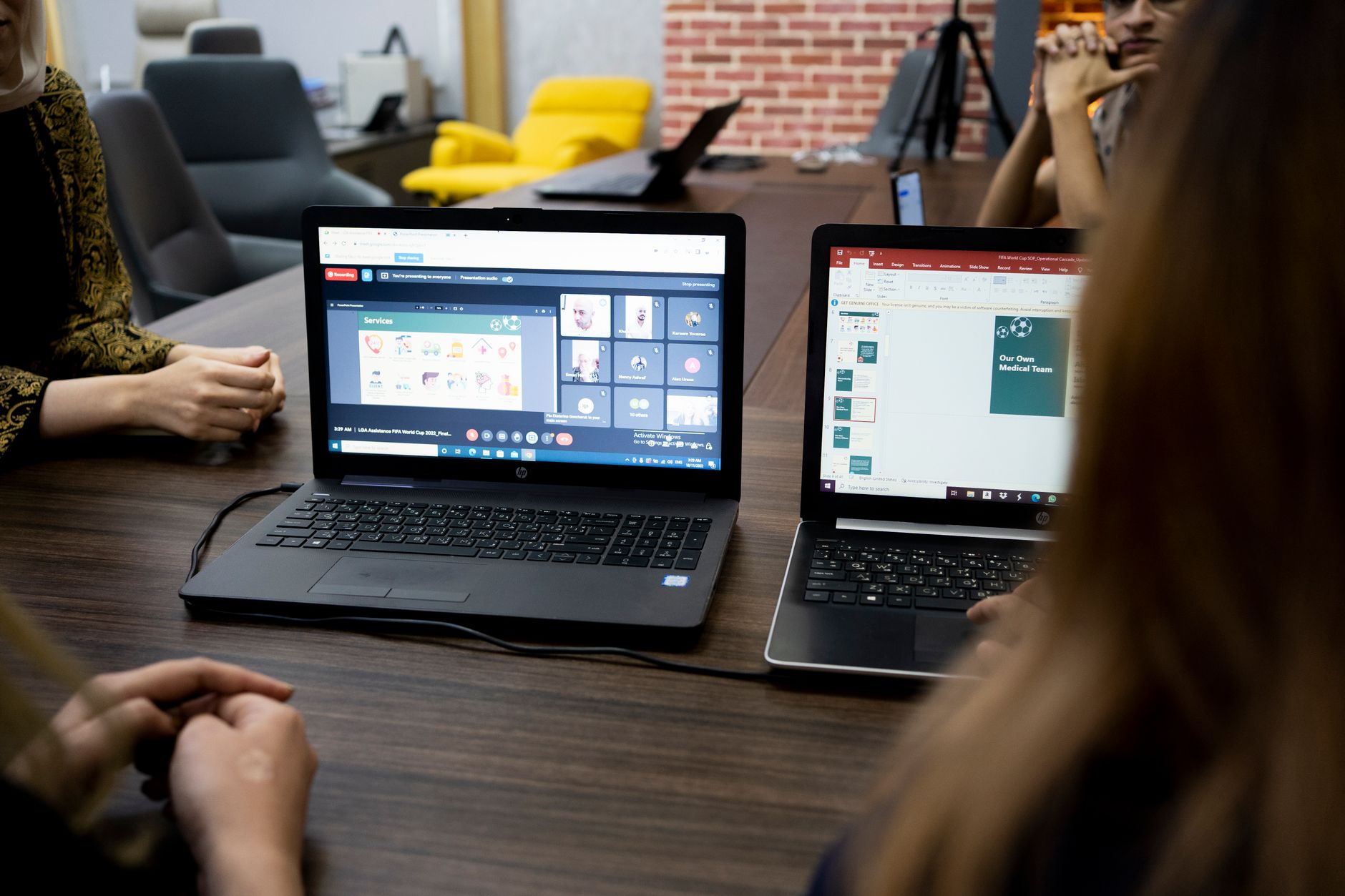 Customer success team reviewing software adoption