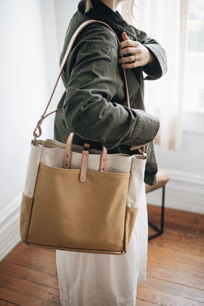 Canvas and leather market tote in a warm minimalist interior