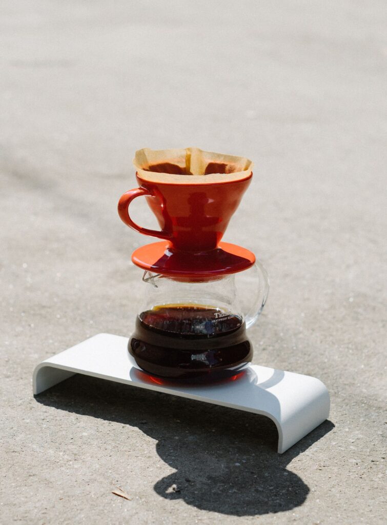 Minimal ceramic pour-over dripper on a glass carafe