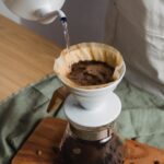Close detail of a warm-toned pour-over coffee ritual