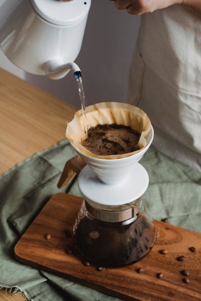 Close detail of a warm-toned pour-over coffee ritual